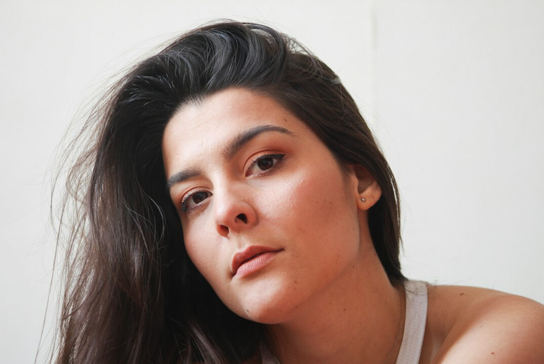 Portrait of a young woman with dark hair